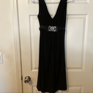 Black, slimming dress with diamond detailing